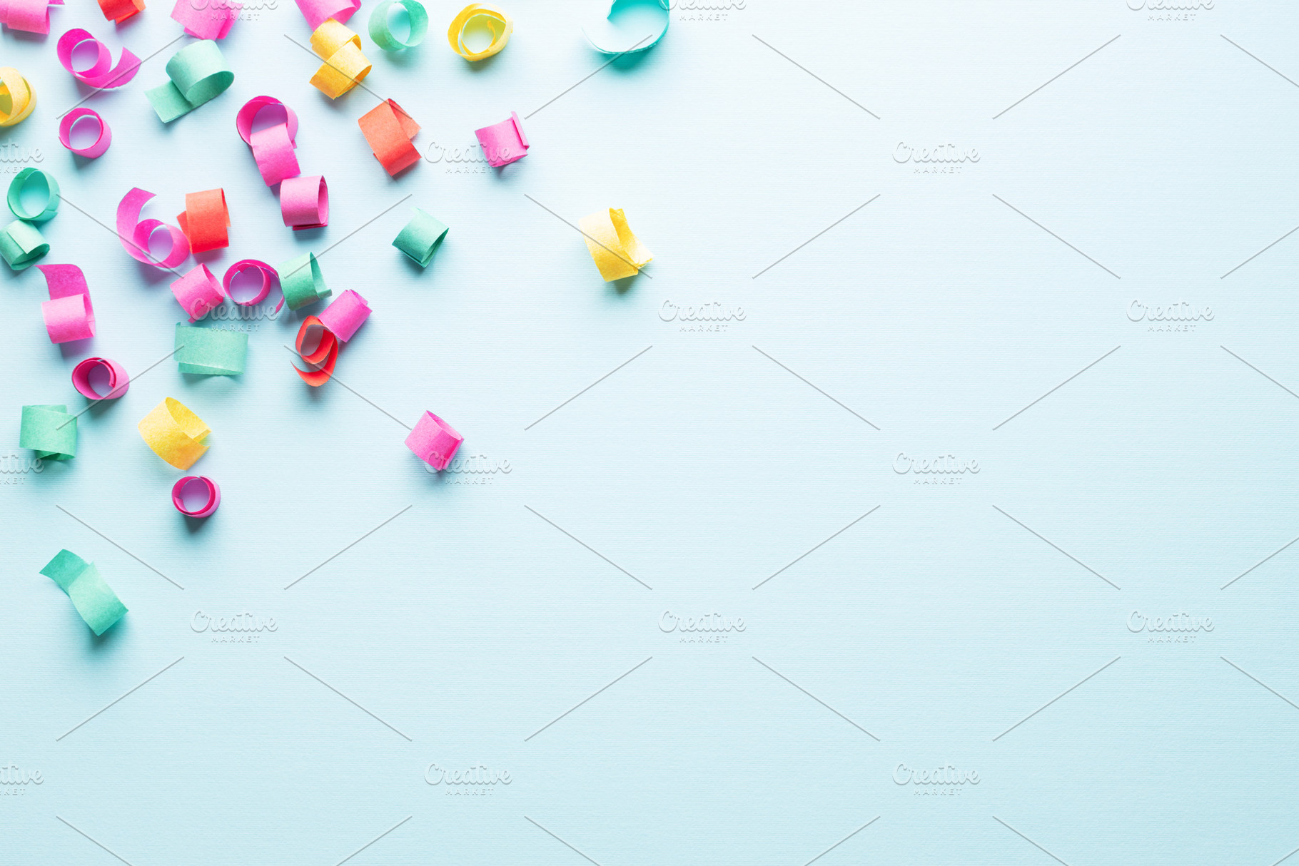 Colorful paper confetti, a Holiday Photo by Olga_Z