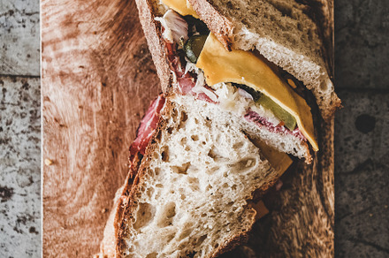 Flat-lay of pastrami sandwich slices, a Food & Drink Photo by Foxys