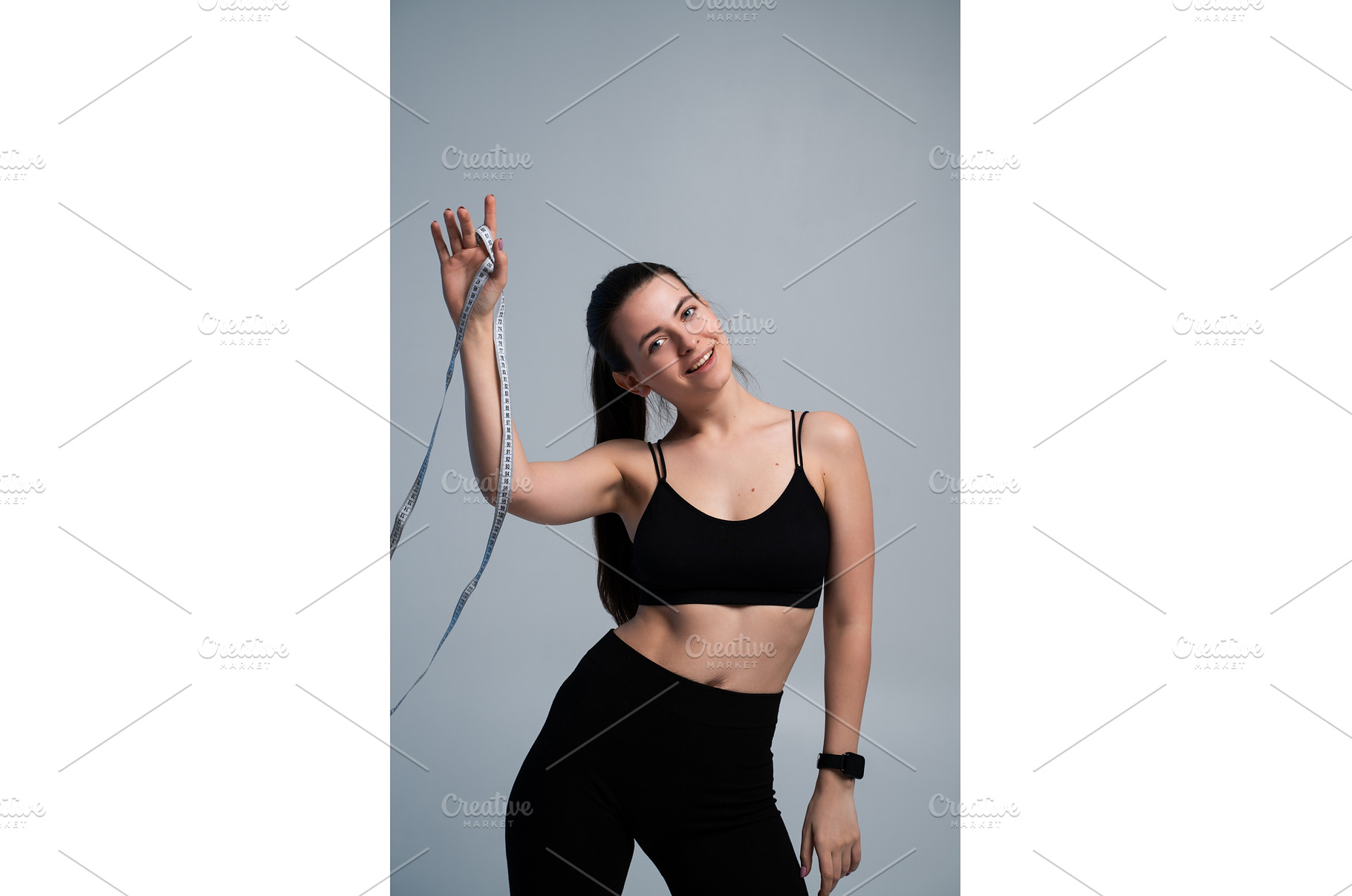 Woman standing against a gray, a Sports & Recreation Photo by volodymyrshtun13795