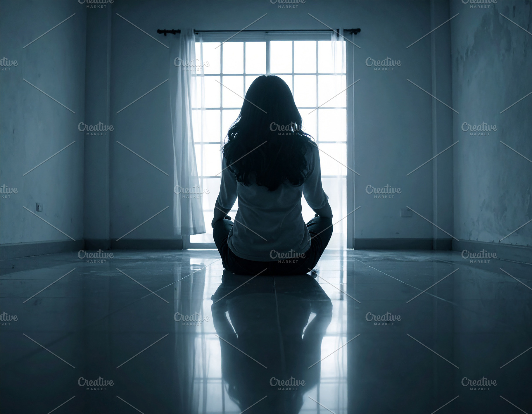 Woman sitting alone in dark room facing bright window, a Person Photo by DanFLCreativo