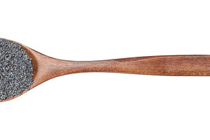 Poppy seeds in a dark wooden spoon, isolated background, top vie, a Food & Drink Photo by ndanko