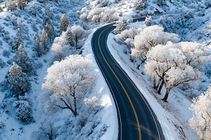 Scenic aerial view of a winding road, a Nature Photo by MistyDay
