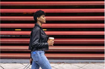 Cool Afro Tourist Woman Walking