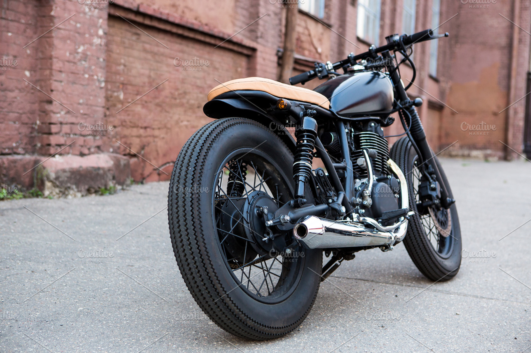 Cafe racer motorcycle on parking stock photo containing adult and beautiful, a Sports & Recreation Photo by Mikalai