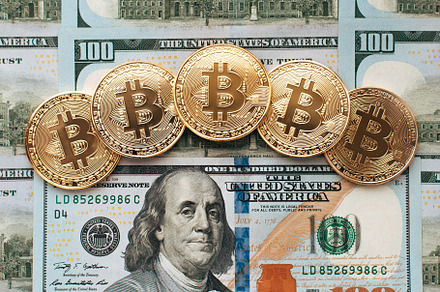 Coins bitcoin there are money on table a note of 100 dollars the banknotes