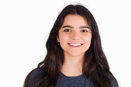 Portrait of young woman in a studio., a Background Photo by Mego-studio