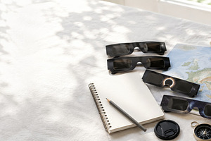 Solar eclipse watching essentials on, a Photo by Dvoevnore photos