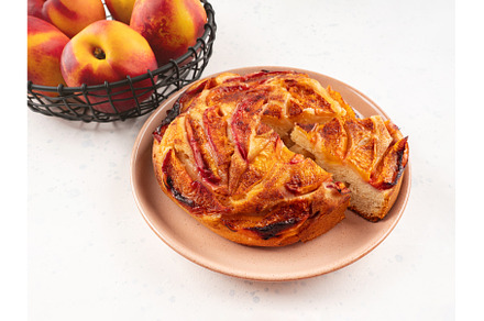Vegan nectarine peach cake on white