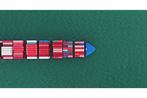 Cargo ship transporting containers, a Transportation Photo by Goinyk
