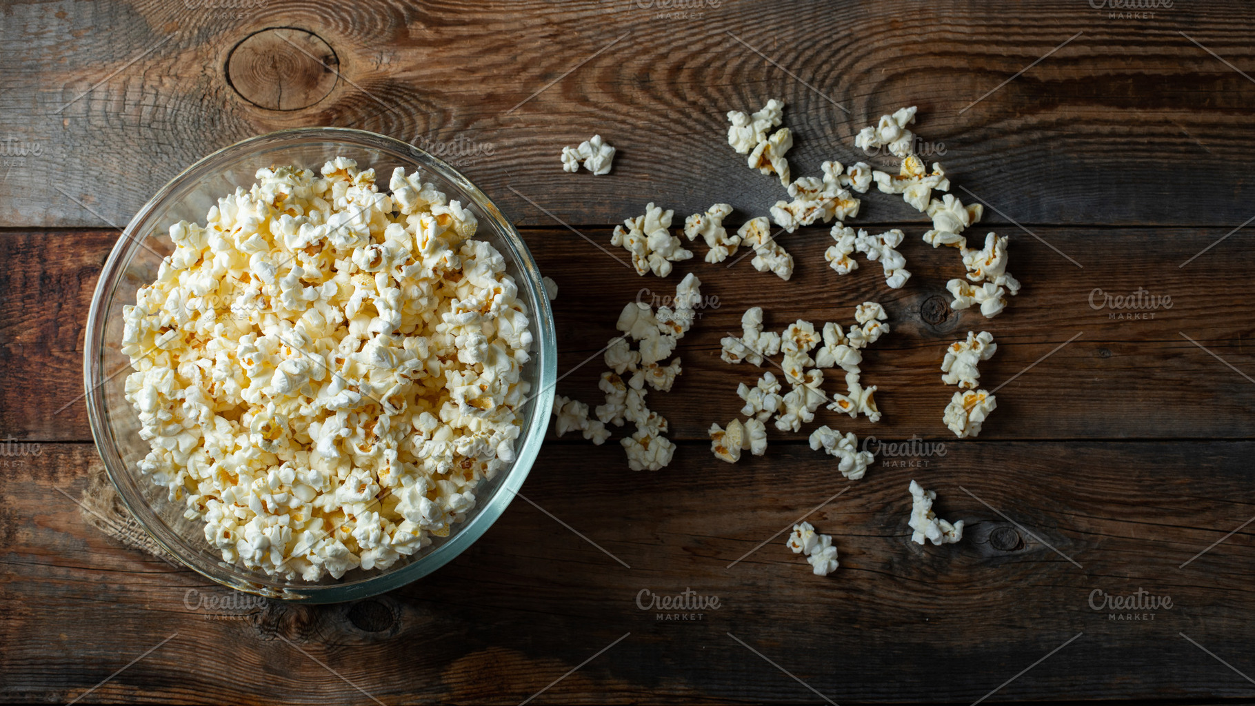 Popcorn on wood color background.Food and snack concepts ideas.Minimal style to, a Food & Drink Photo by Budarinphoto
