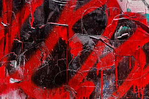 Layered red graffiti texture