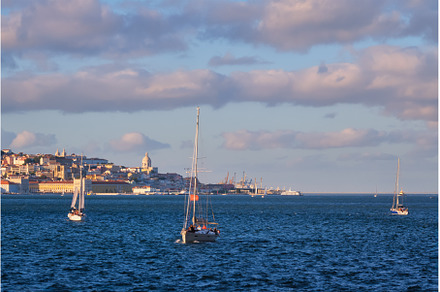 View of Lisbon view over Tagus river, a Transportation Photo by f9photos