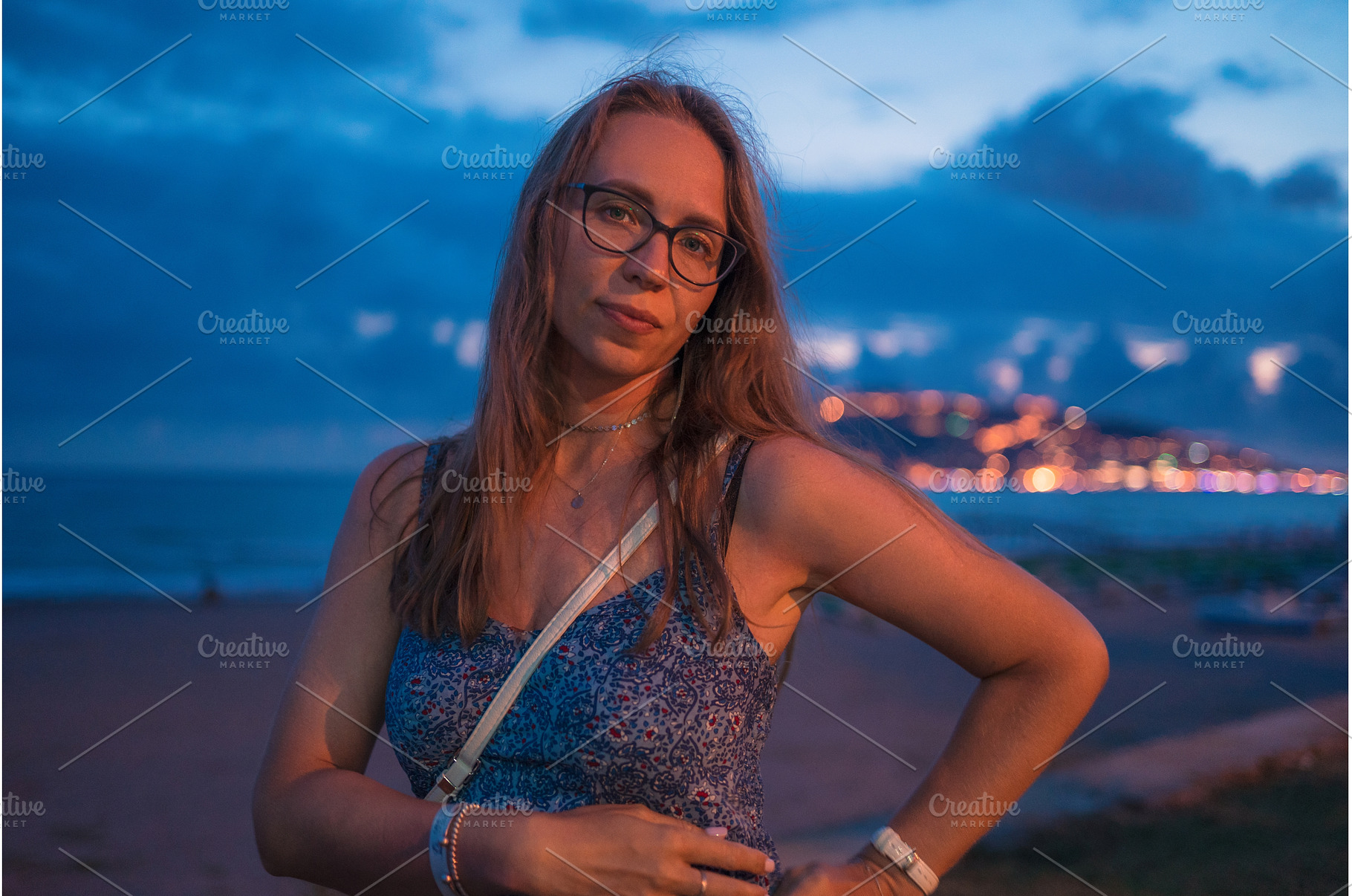 Woman on the beach at the sea in, a Person Photo by Jan Jack Russo Media