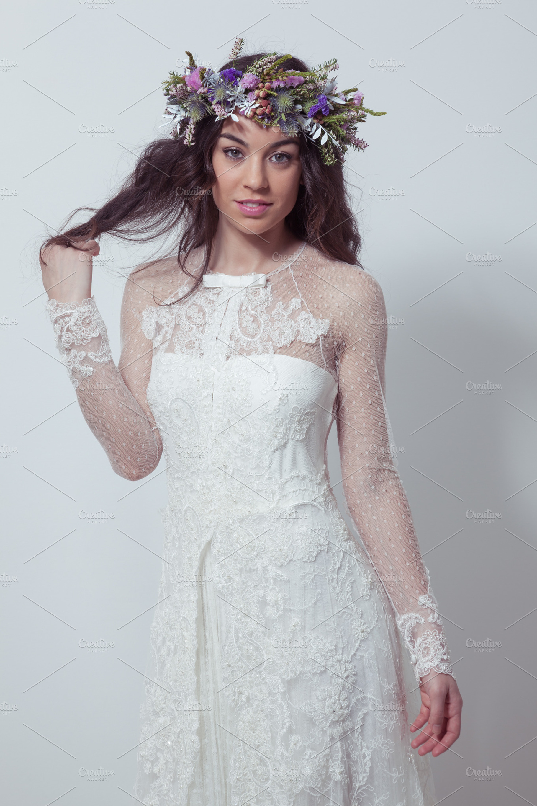 Bride posing with flower crown featuring beautiful, bride, and brunette, a Person Photo by Ernesto Solla