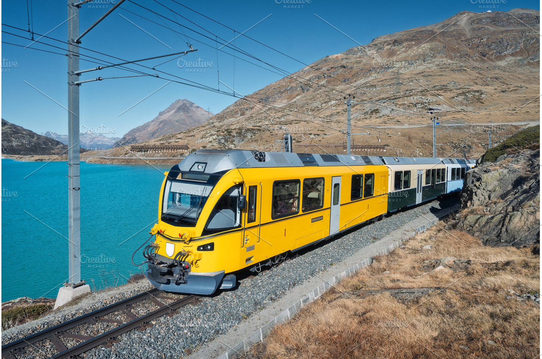 Yellow Bernina Express train, a Transportation Photo by den-belitsky
