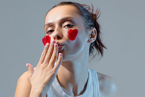 Candy heart blush on happy girl, a Person Photo by Photos for every occasion