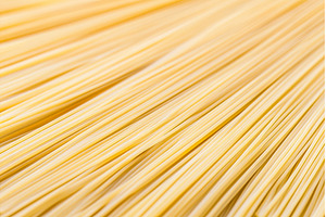 Close up view of uncooked spaghetti, a Food & Drink Photo by Lermont51