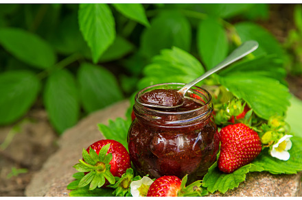 Homemade strawberry jam in a jar, a Food & Drink Photo by yanadjana