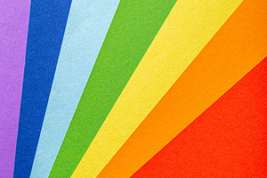 Paper rainbow colored rays stripes featuring rainbow, background, and copy