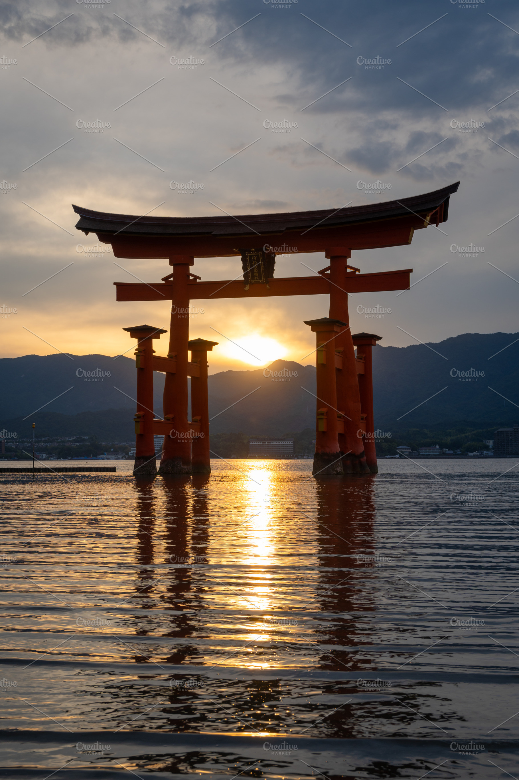 Famous red torii gate of Itsukushima shrine at sunset in Miyajim, an Architecture Photo by GoodGoods