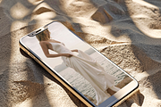 Golden Sand Phone Mockup, an iPhone Mockup by The Ethical Agency (Thumbnail 1 of 4)