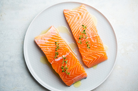 Fresh salmon fillet on a plate for delicious salmon steak.