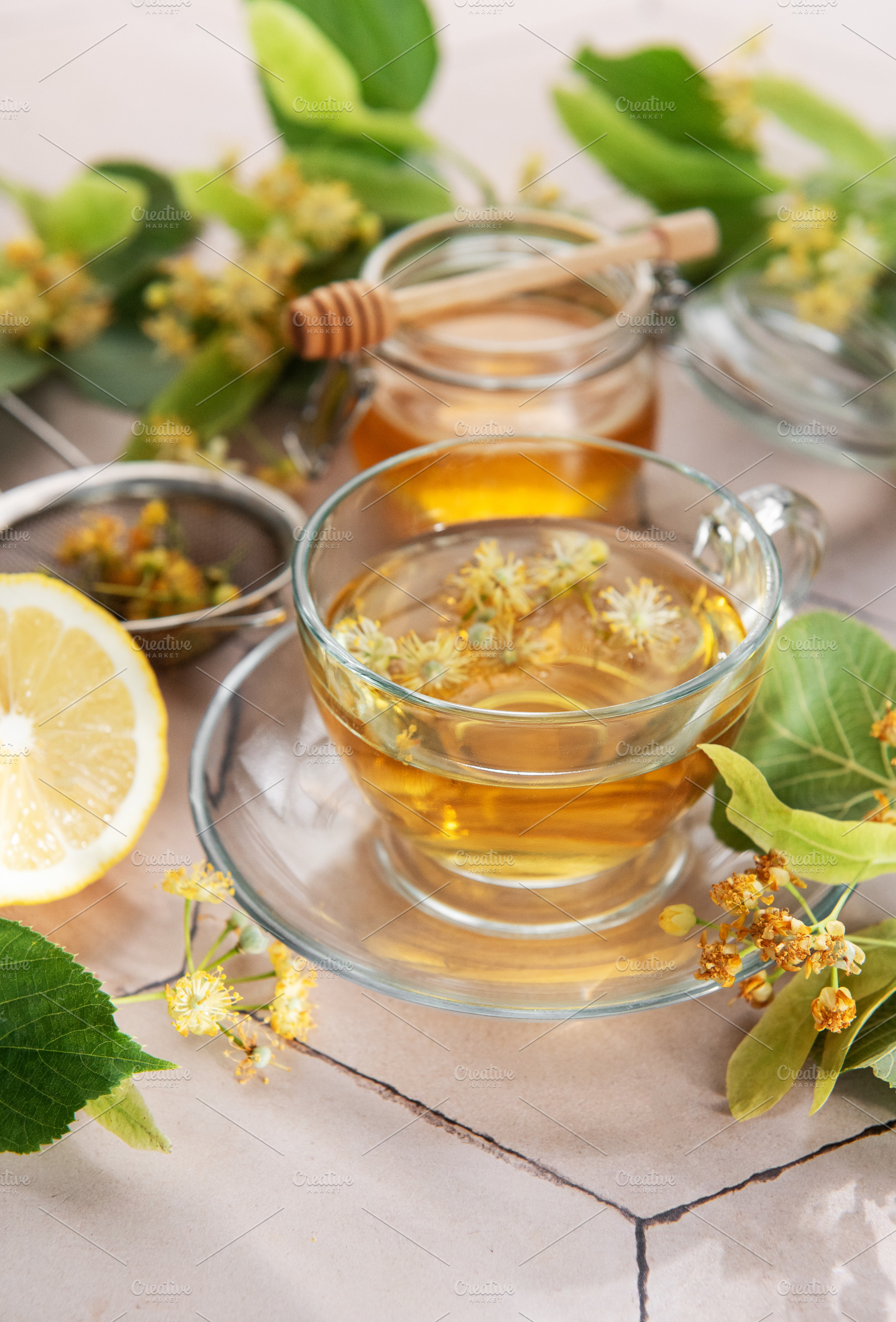 Linden flower herbal tea with honey and lemon, a Food & Drink Photo by Olena Rudo