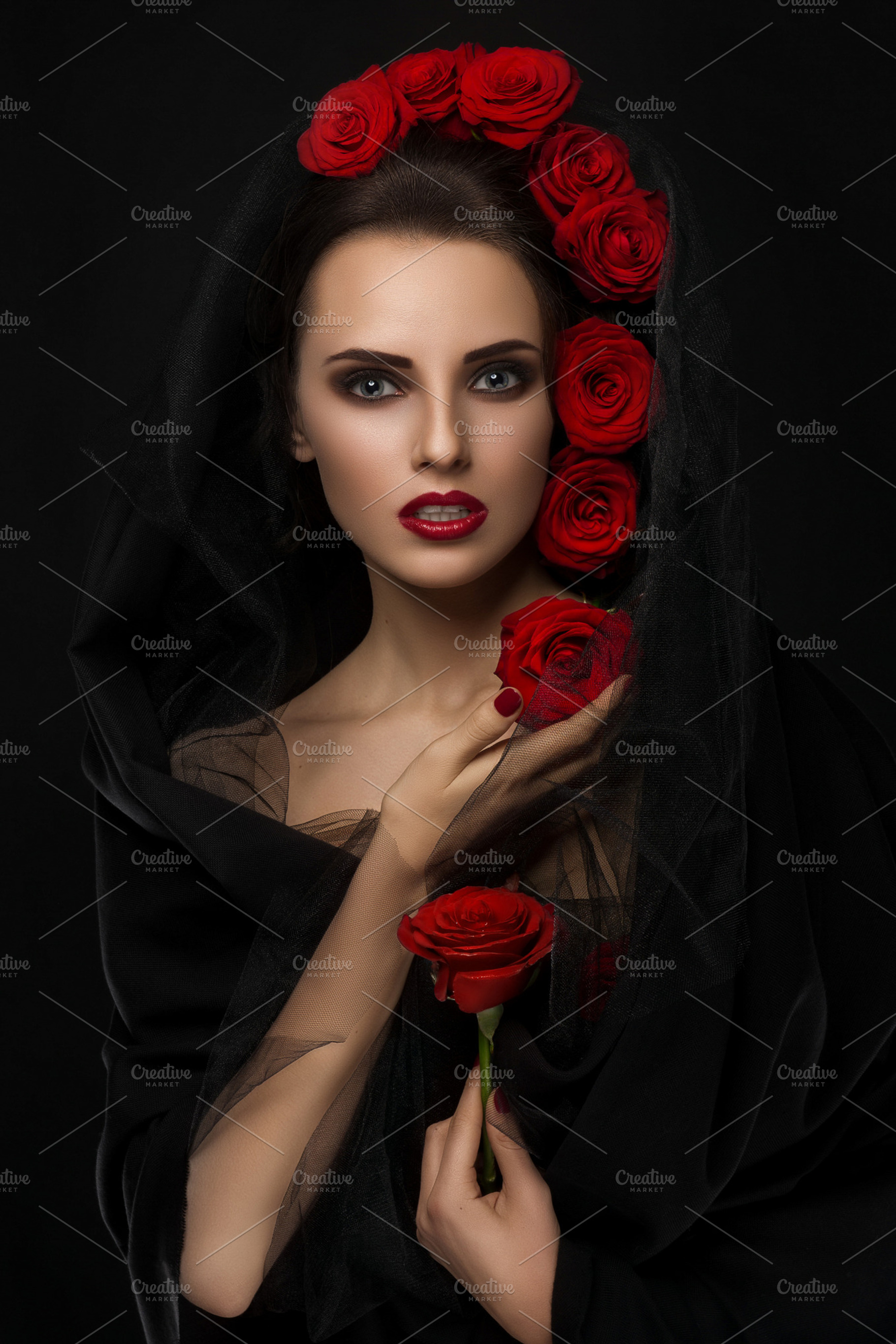 Girl with flowers in her hair on the clackbackground stock photo containing, a Beauty & Fashion Photo by Slava Samoilenko