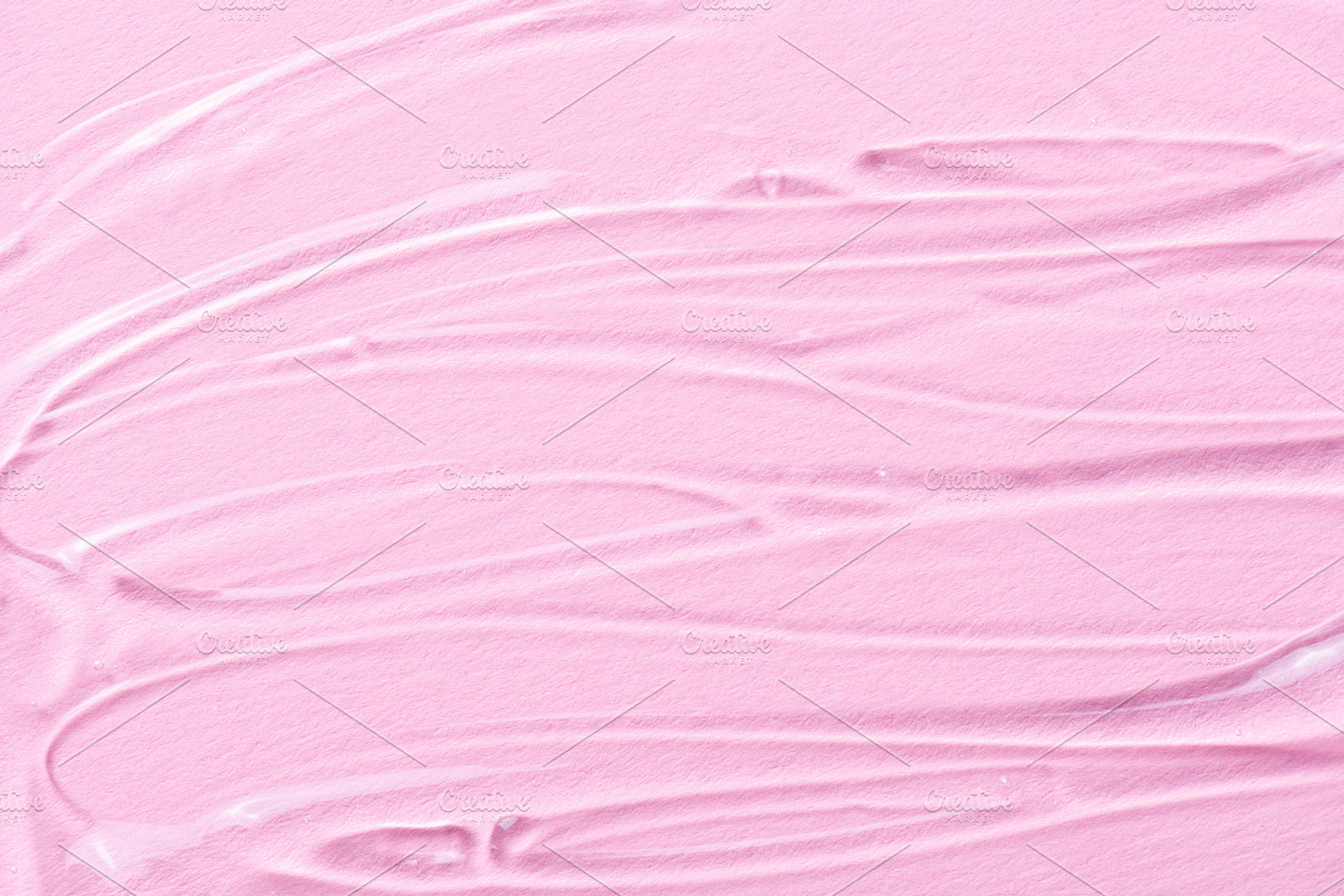 Liquid gel cosmetic texture on pink, a Beauty & Fashion Photo by LanaSweet