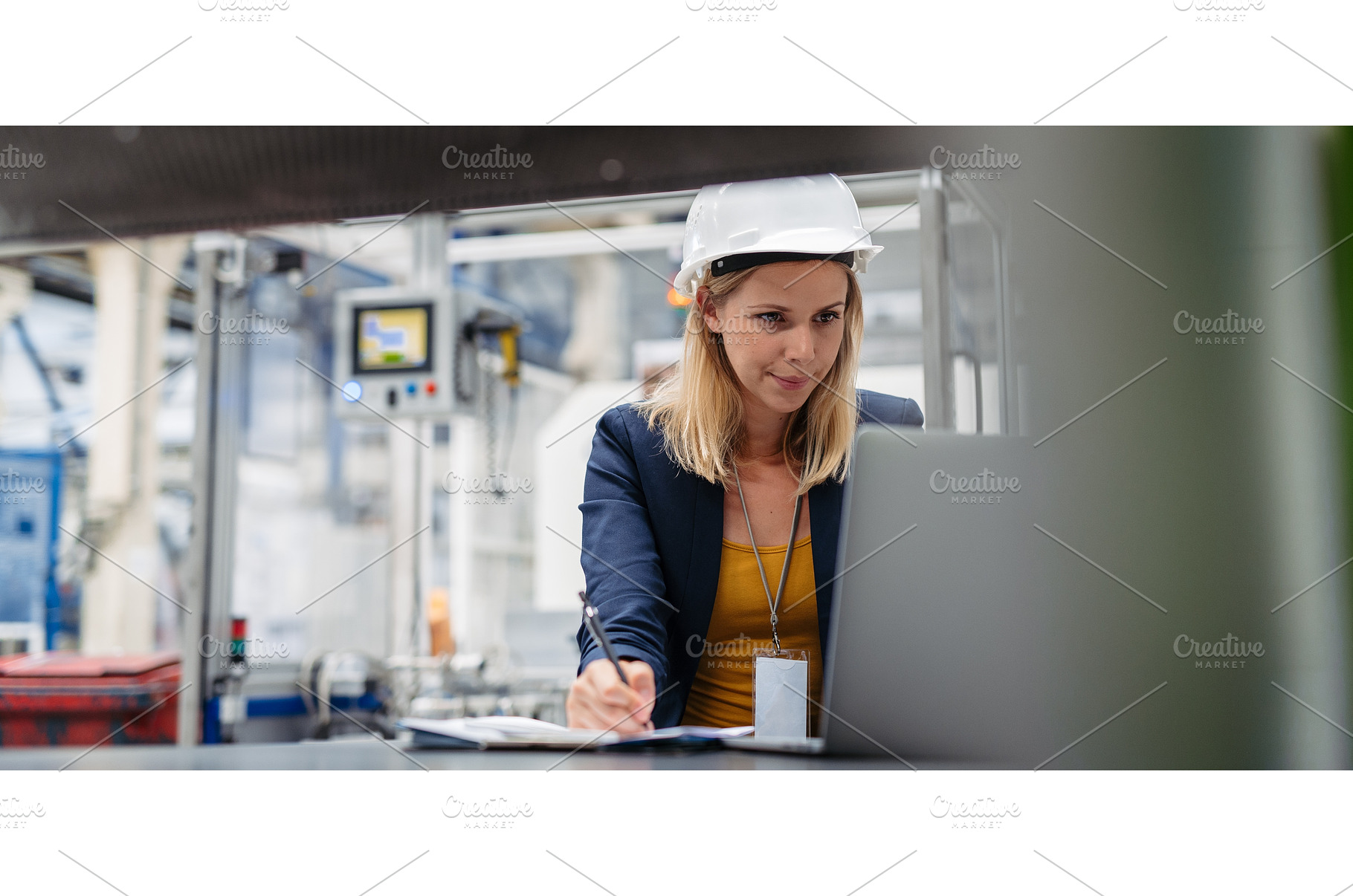 Female engineer or technician, an Industrial Photo by HalfPoint