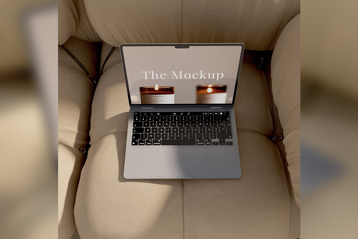 Laptop Mockup on Beige Sofa, a Device Mockup by Art-Jek.std (Photo 1 of 4)
