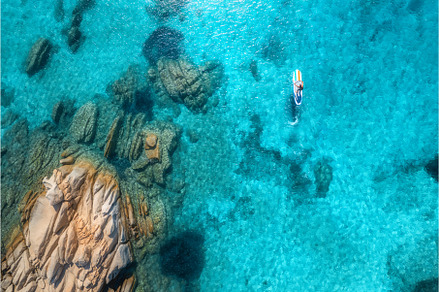 Aerial view of with man on sup board, a Nature Photo by den-belitsky
