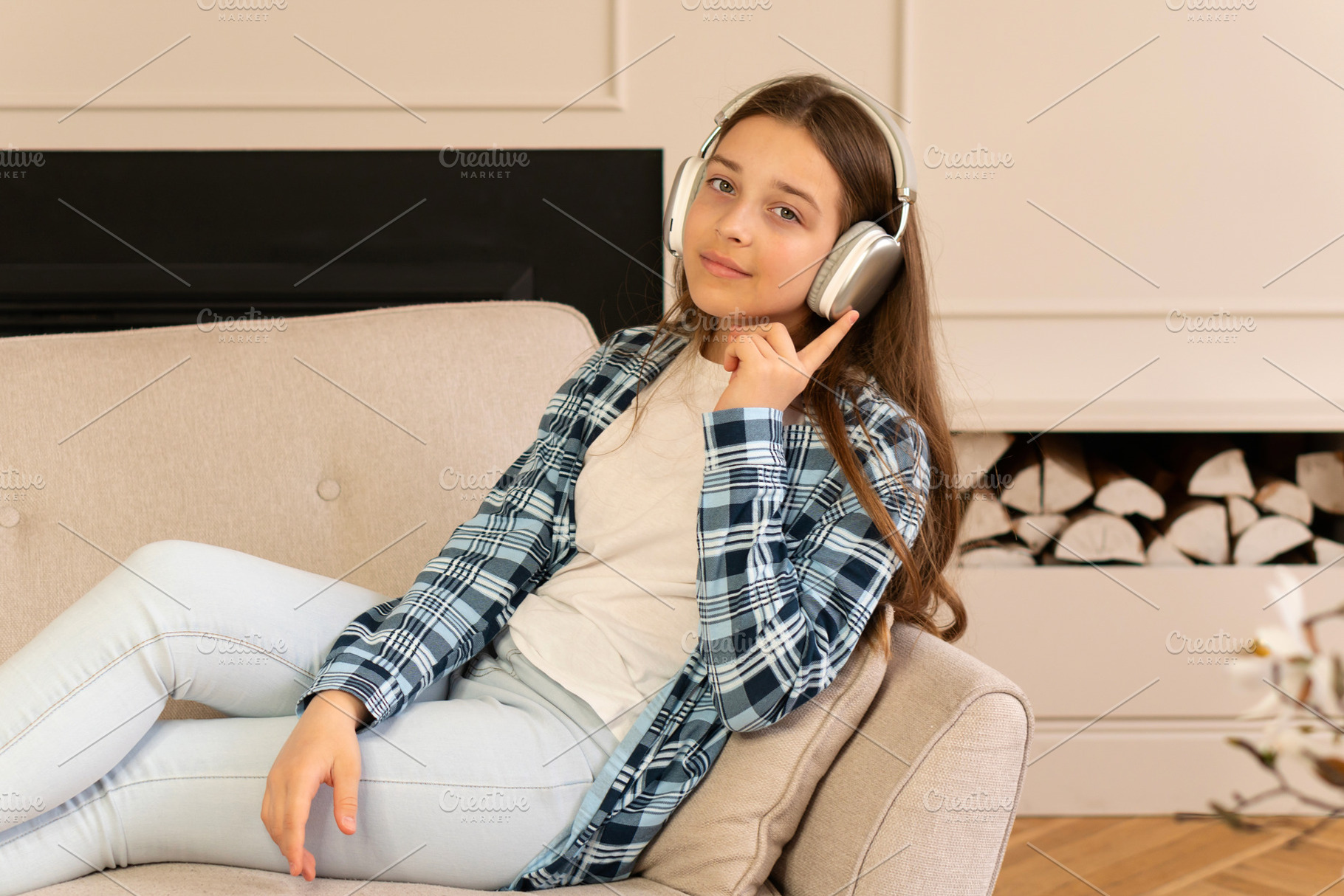 Teen girl relaxing comfortably, a Photo by Elena Vagengeim