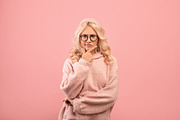 Serious woman thinking about question, touching chin and looking at camera, sta, a Photo by Prostock-Studio (Thumbnail 2 of 2)