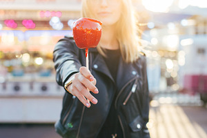 Woman at fair carnival w sugar apple containing girl, love, and food