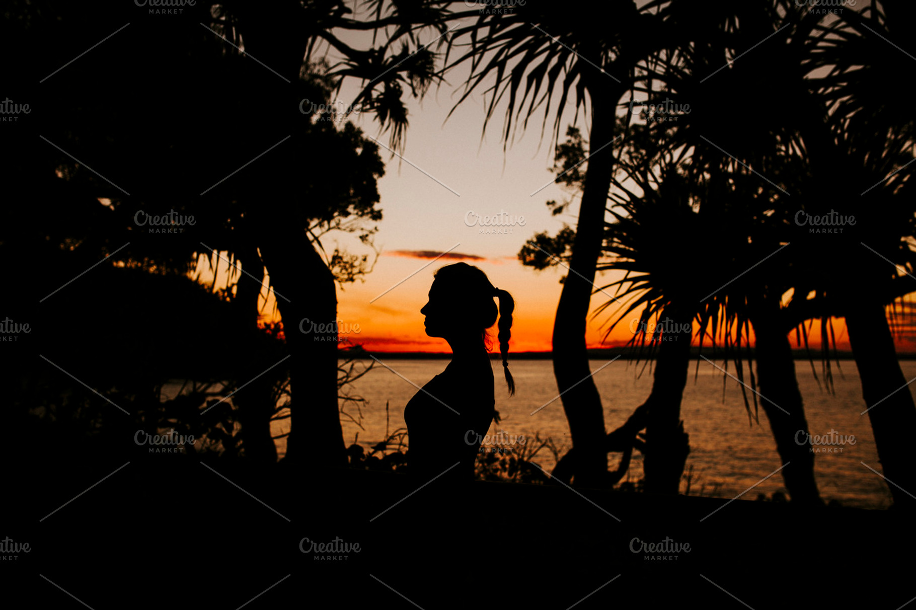 Sunset Silhouette of Beautiful Woman, a Photo by Heart Visuals
