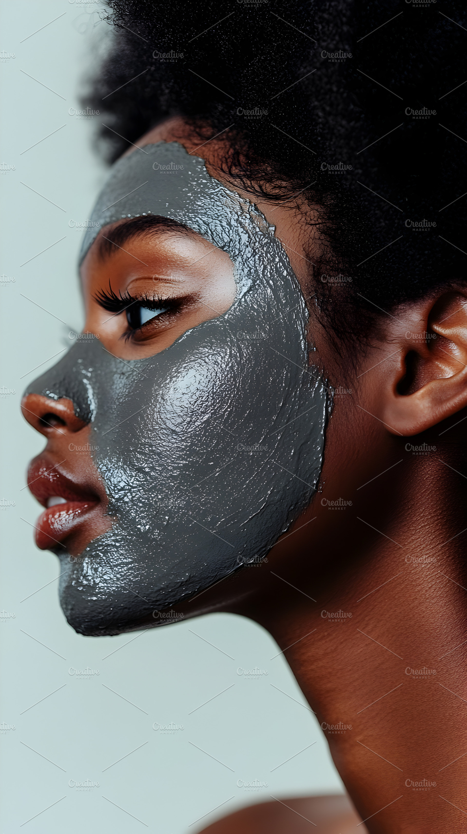 Woman with charcoal clay facial mask, a Person Photo by Photostock