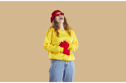 Girl dressed in 1980s style posing