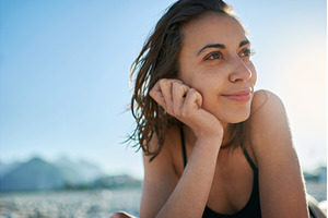 Close up face of woman at beach