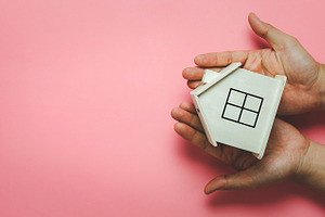 Home insurance business concept stock photo containing model and white
