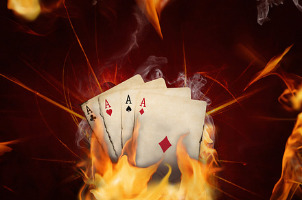 Four aces playing cards burning in flames of passionate game, a Food & Drink Photo by Antonio Gravante Market