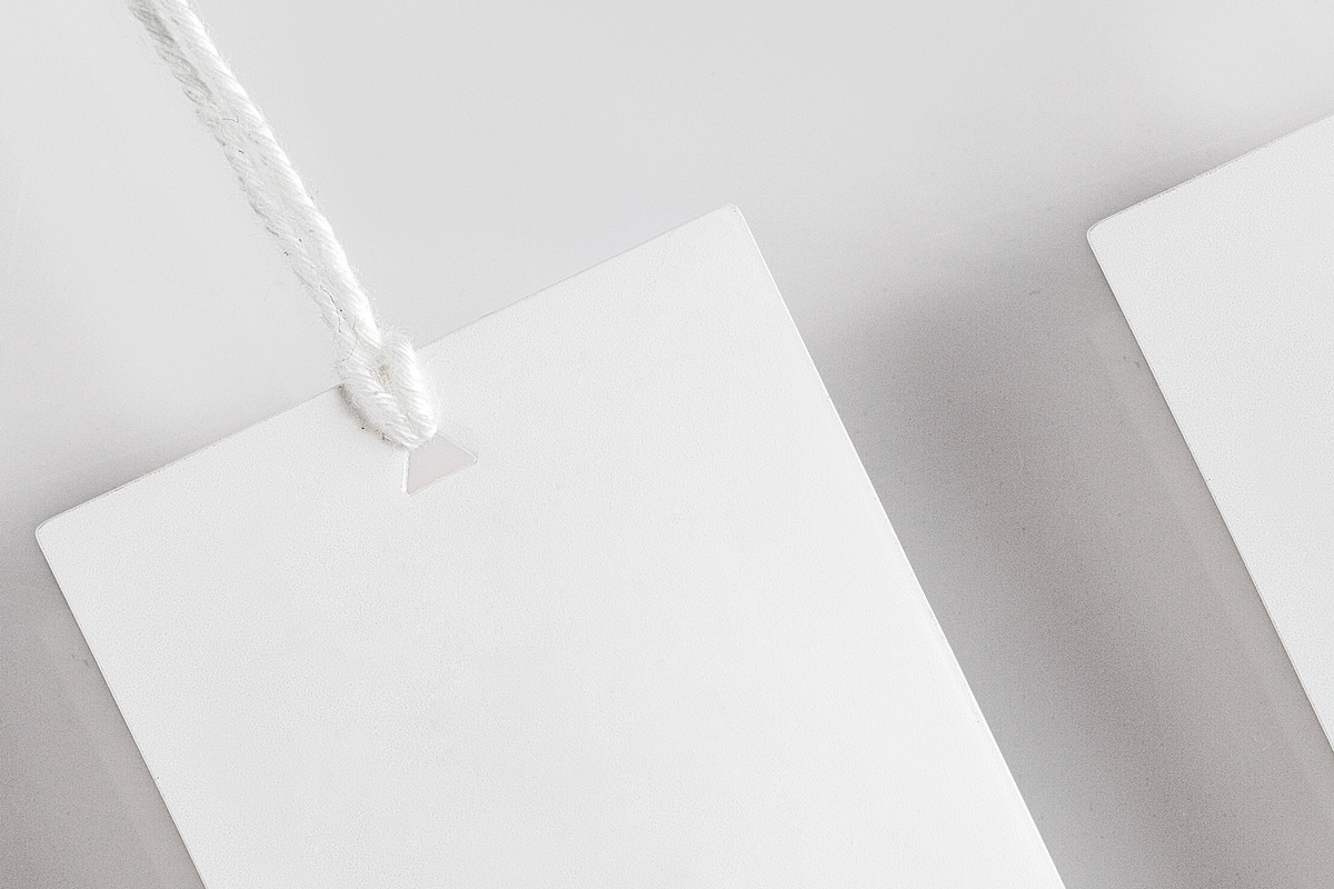 Clothes label tag blank white mockup, an Advertising Mockup by Olha Klein (Photo 3 of 3)