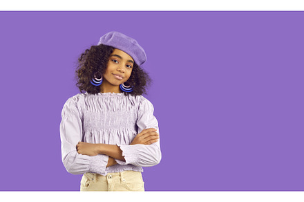 Teen African American girl on violet, a Beauty & Fashion Photo by StudioRomantic