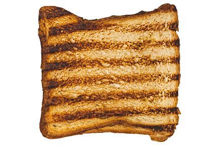 Slice of burnt toasted bread, a Food & Drink Photo by BOOCYS