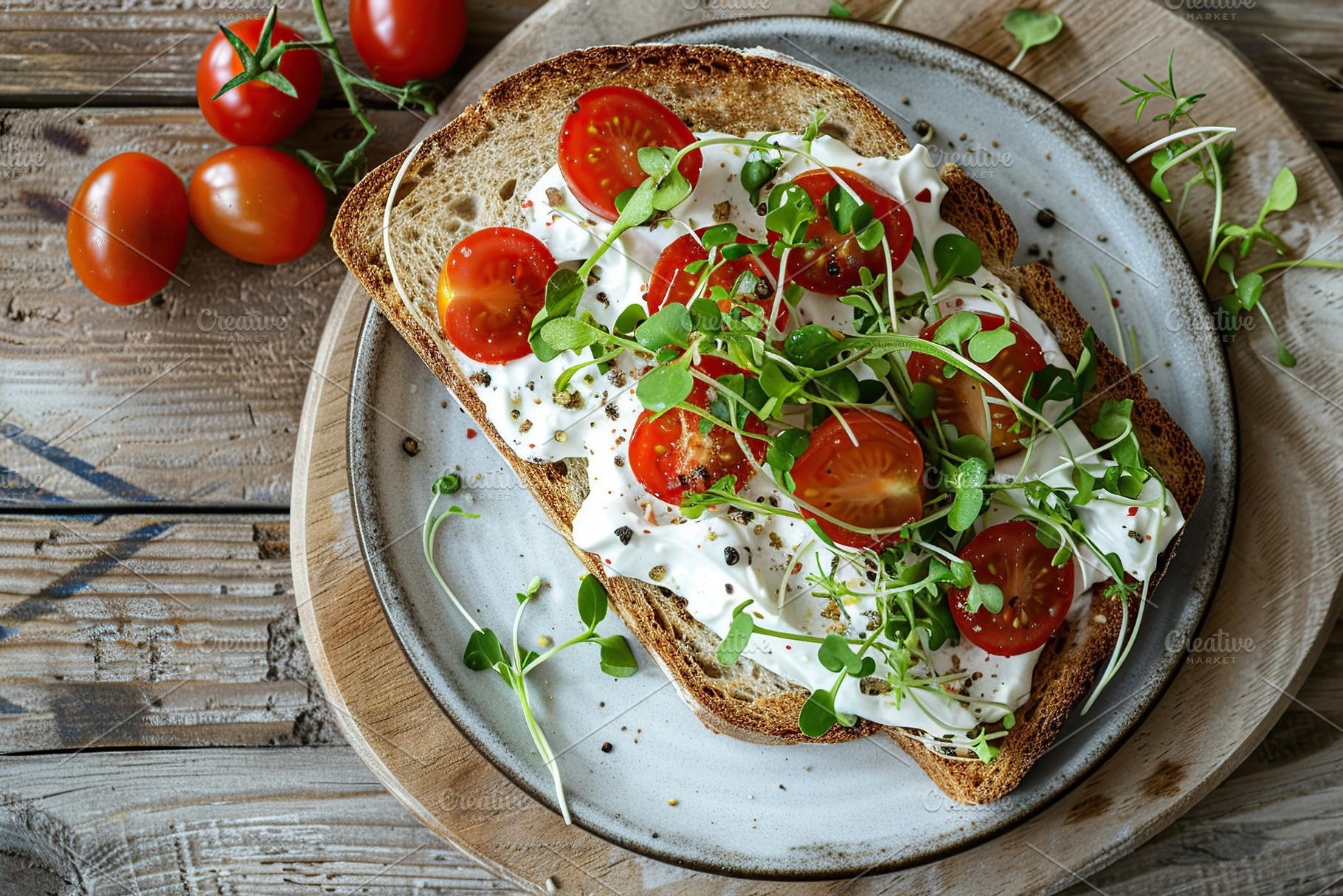 Sandwich with cream cheese, microgreens and tomatoes on wooden table, a Food & Drink Photo by AlyaAnd