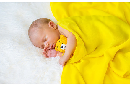Newborn baby sleeping on a white, a Beauty & Fashion Photo by yanadjana