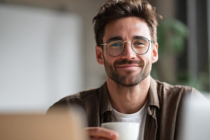 Enjoying coffee at a workspace, a Photo by Beautiful things