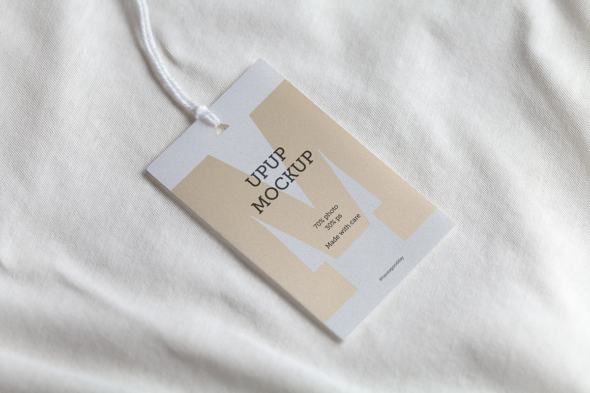 Clothes label tag blank white mockup, an Advertising Mockup by Olha Klein (Photo 1 of 3)