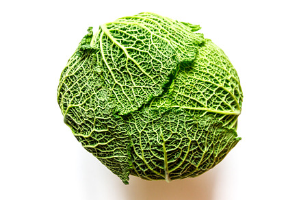 Savoy cabbage isolated on a white background, a Food & Drink Photo by GoodGoods
