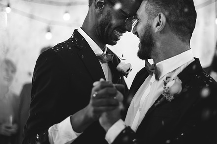 Sweet gay couple featuring person, holding, and occasion, a Person Photo by rawpixel